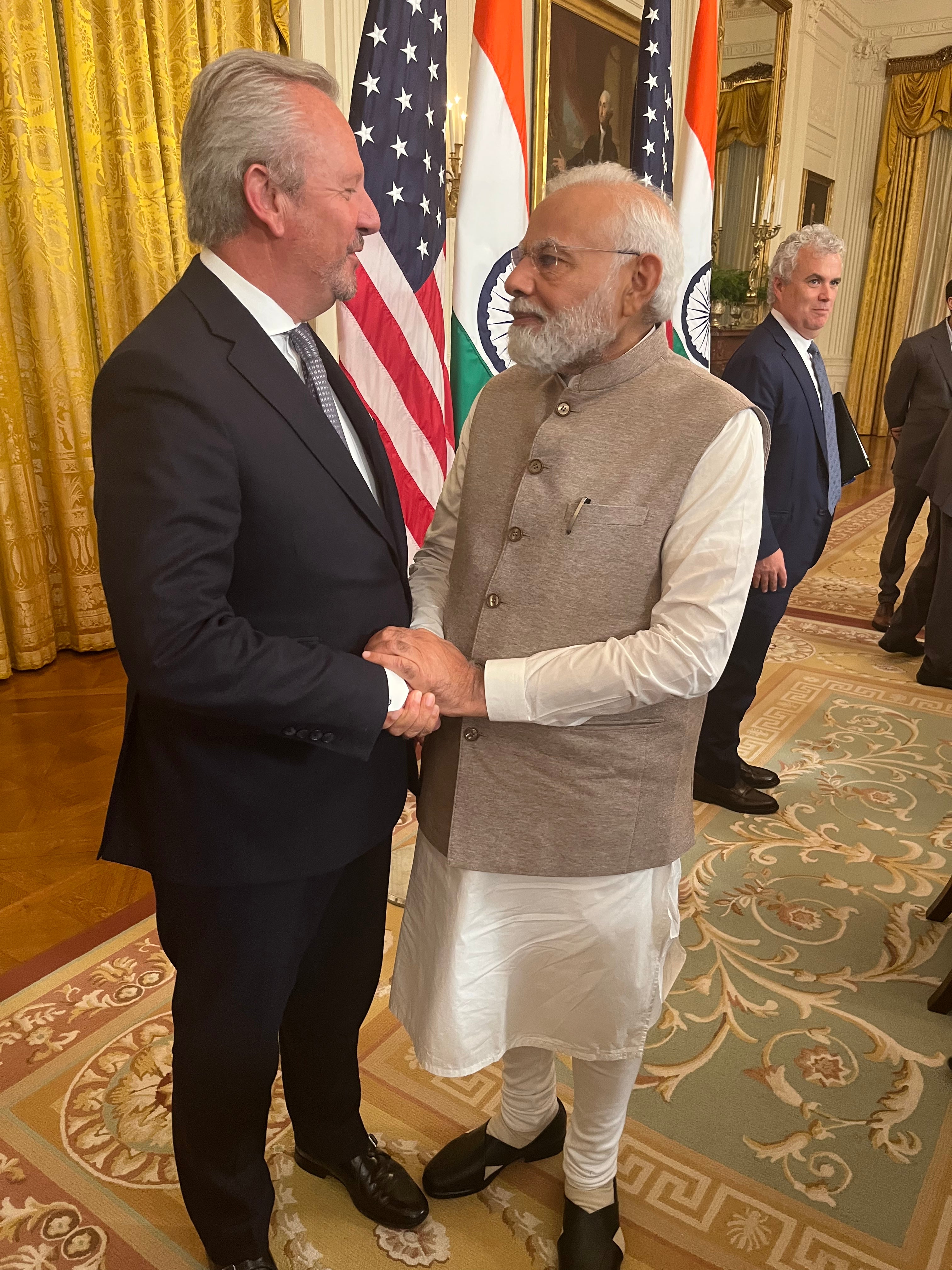 FMC Corporation CEO Mark Douglas shakes hands with Prime Minister Narendra Modi. 