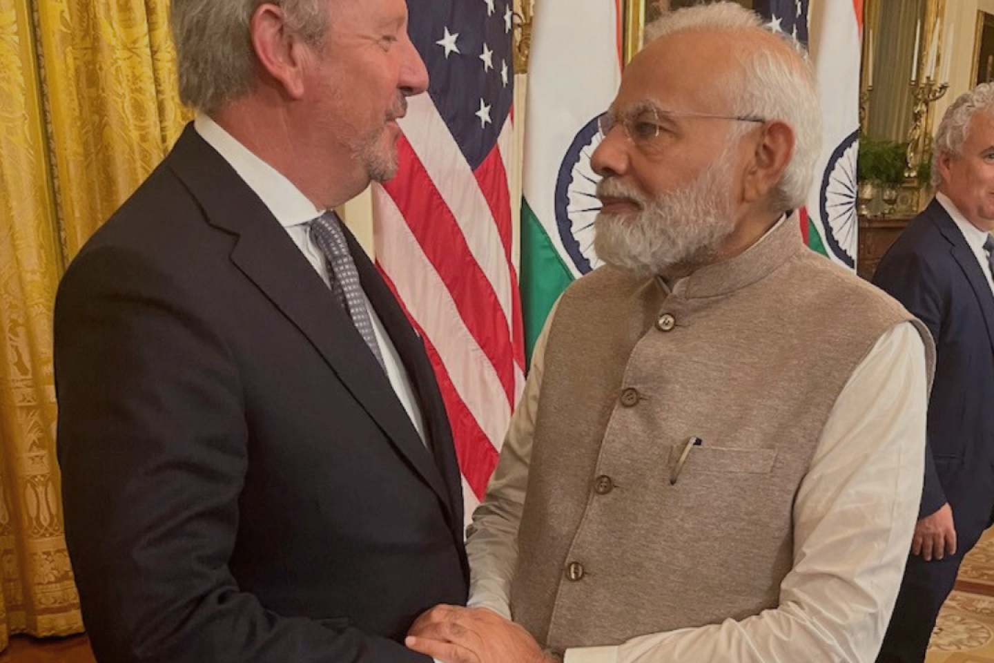 FMC Corporation CEO Mark Douglas shakes hands with Prime Minister Narendra Modi. 